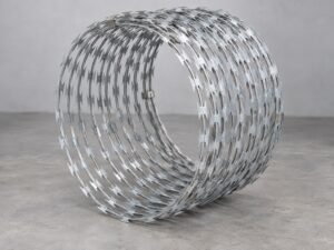 Concertina razor wire installed on an industrial security fence